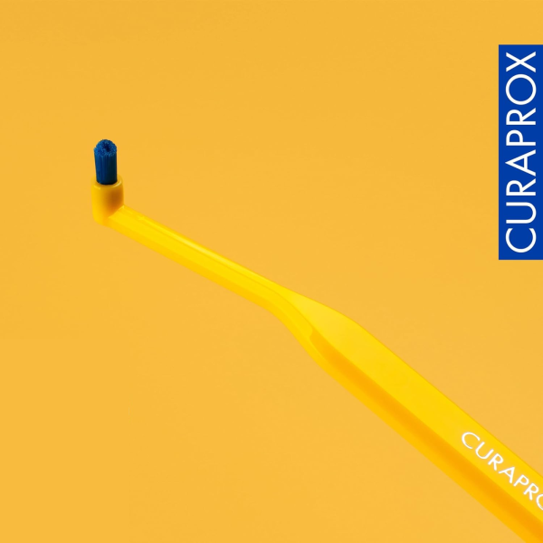Монопучковая щетка CURAPROX CS1009 МАЛИНОВАЯ