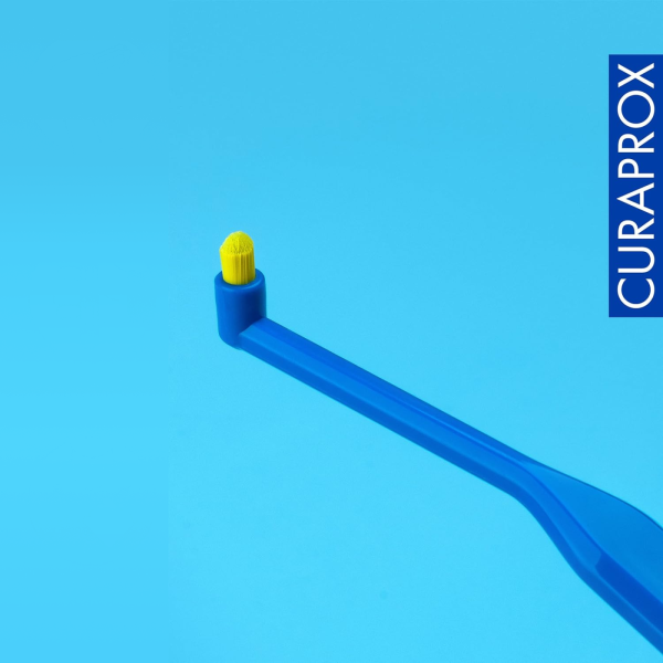 Монопучковая щетка CURAPROX CS1006 ФИОЛЕТОВАЯ